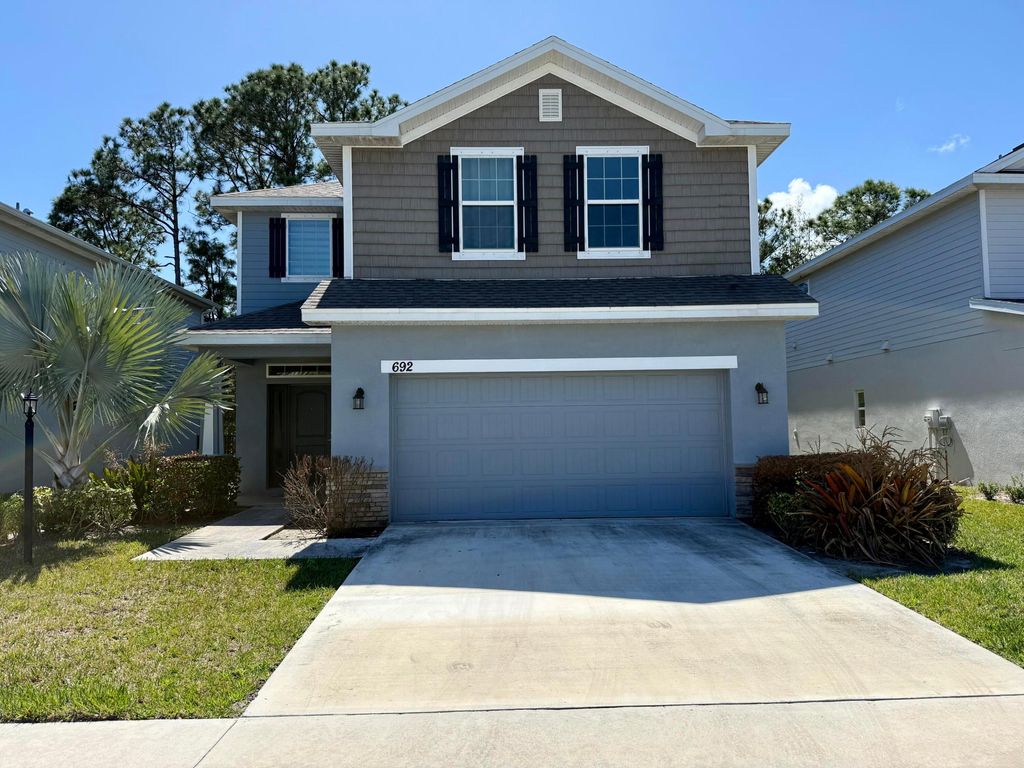 Photo of 692 NE Turtleback Trail, Port Saint Lucie, FL 34983 (MLS # B26001310)