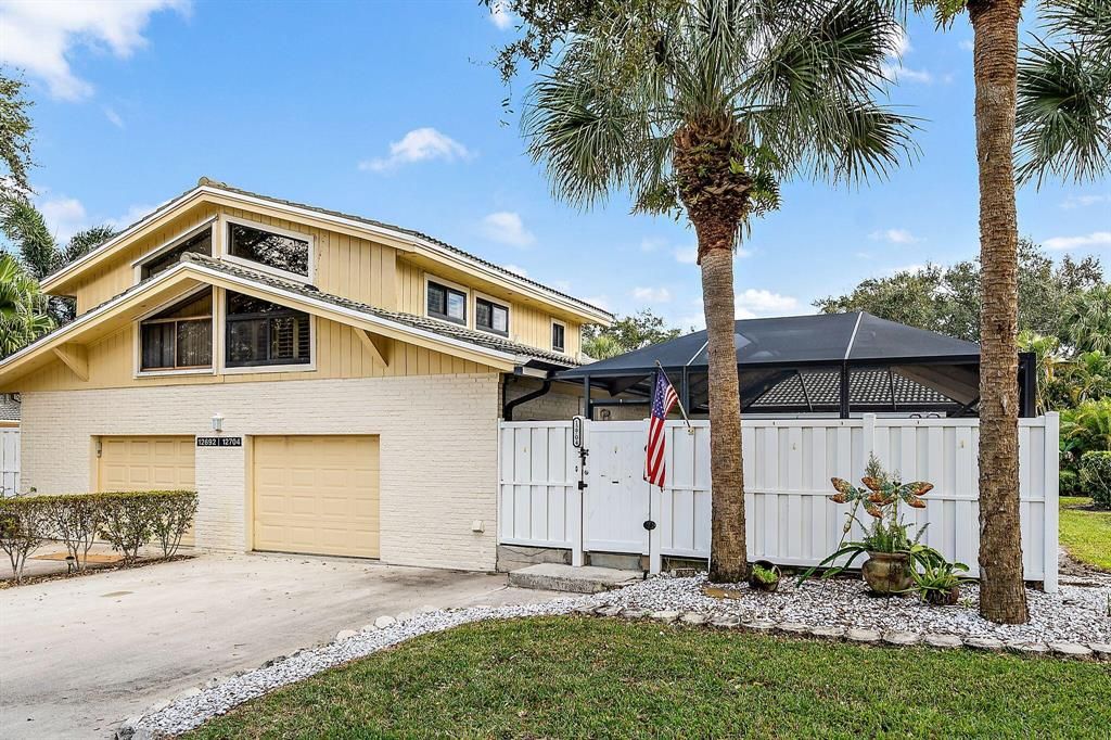 Photo of 12704 Woodmill Drive Dr, Palm Beach Gardens, FL 33418 (MLS # R10774835)
