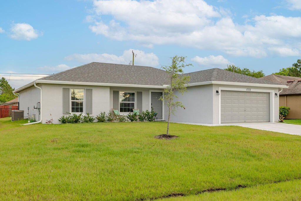 Photo of 1733 SW Columbia Street, Port Saint Lucie, FL 34987 (MLS # R10800721)