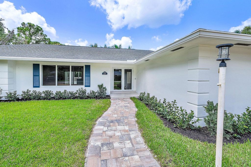 Photo of 5686 Shirley Drive, Jupiter, FL 33458 (MLS # R11164070)