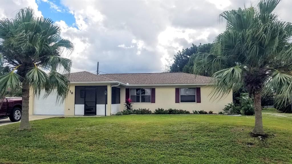 Photo of 1418 SE Santurce Road, Port Saint Lucie, FL 34952 (MLS # R10761004)