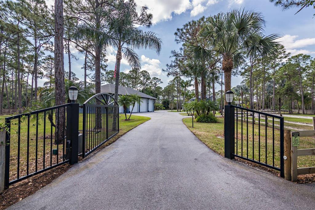 All sizes approximateYour dreams have come true! This is the house you will proudly call home!This home has the space and privacy you have been looking for! Want out of the city but remain nearby...here it is!! This picture perfect home sits on 5.27 beautifully manicured acres! Property is all framed in with a three board fence and a impressive automatic gate!Home has been completely updated and is truly turn key!Once through the gate you will be escorted along a new expanded asphalt driveway meandering along the parklike setting. Recently freshly landscaped including plants, trees and even sod!As you walk up to the home the recently expanded and remodeled front porch will welcome you in. Home has recently been painted and redesigned with a modern day farm house feel