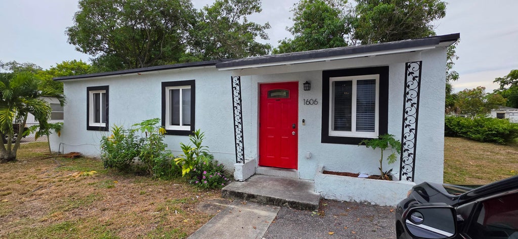 Photo of 1606 NW 13TH Court, Fort Lauderdale, FL 33311 (MLS # B26075931)