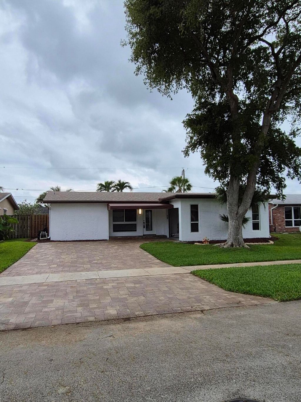 Photo of 11320 NW 31st ST, Sunrise, FL 33323 (MLS # B26031149)