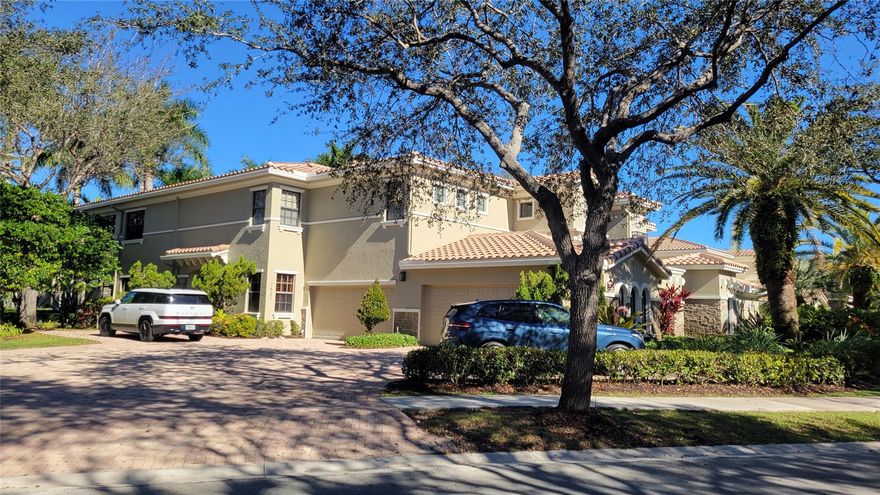 WHEN ONLY THE BEST WILL DO! This PARKLAND GOLF & COUNTRY CLUB town home has it all. Private elevator or stairs will take you into this amazing space. 3 bedrooms plus a den/home office. Separate laundry rm, oversized kitchen with breakfast bar, split floor plan, large screened balcony, 2 car garage. Caseras at Parkland is part of the Parkland Golf & Country Club. A gated community with 24 hour security.