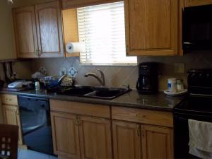 CARRIAGE GATE CONDO - Residential