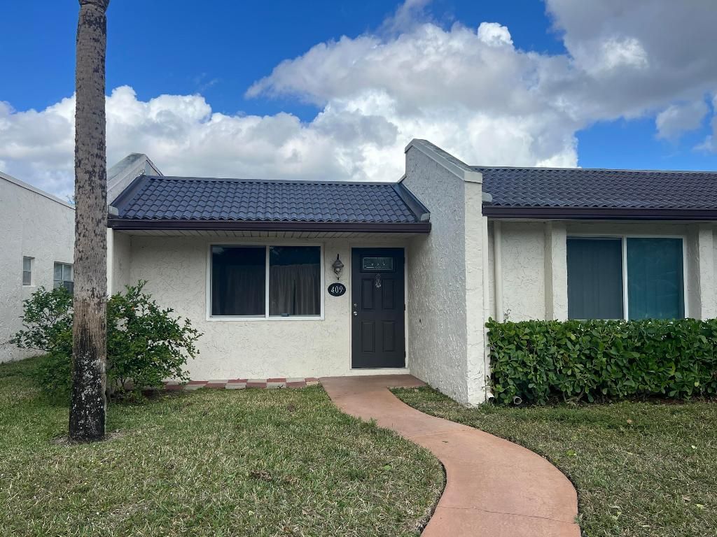 Photo of 409 Golden River Drive, West Palm Beach, FL 33411 (MLS # R11157563)