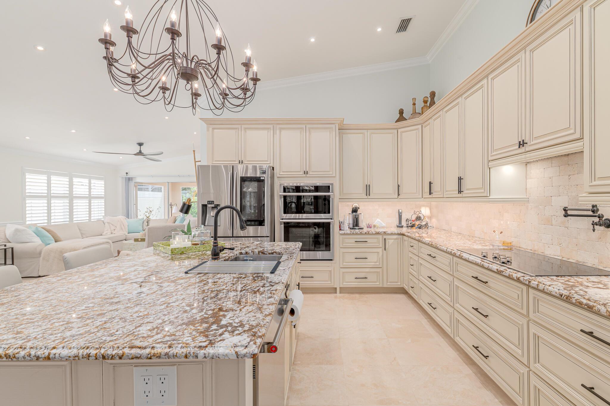 LIVE IN STYLE! Gorgeous 2BR/2BA villa in charming Parkside, tucked on a tree-lined cul-de-sac in Palm City. The open Divosta Capri floor plan flows from the stunning chef's kitchen - featuring a large island, premium appliances & pot filler - into bright living spaces with a cozy fireplace, perfect for entertaining. Unwind in spa-inspired baths or the serene screened lanai. Accordion shutters & security system offer peace of mind. Landscaping & basic cable are included. One small pet is welcome per Landlord approval. Minutes to beaches, golf, dining, shopping, top schools & easy highway access.