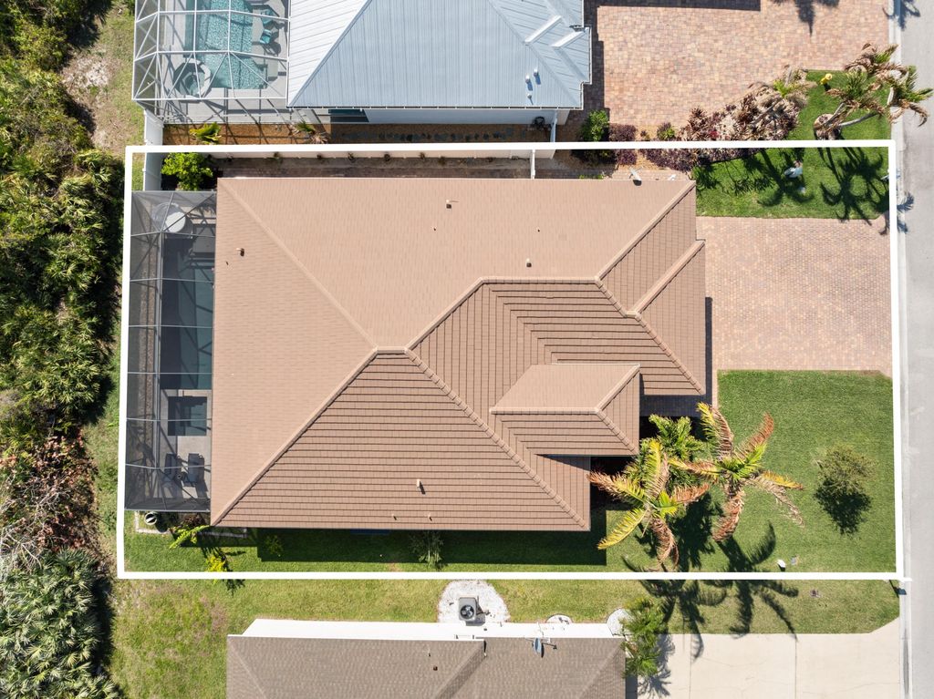 Photo of 445 NW Sunflower Place, Jensen Beach, FL 34957 (MLS # B26008073)