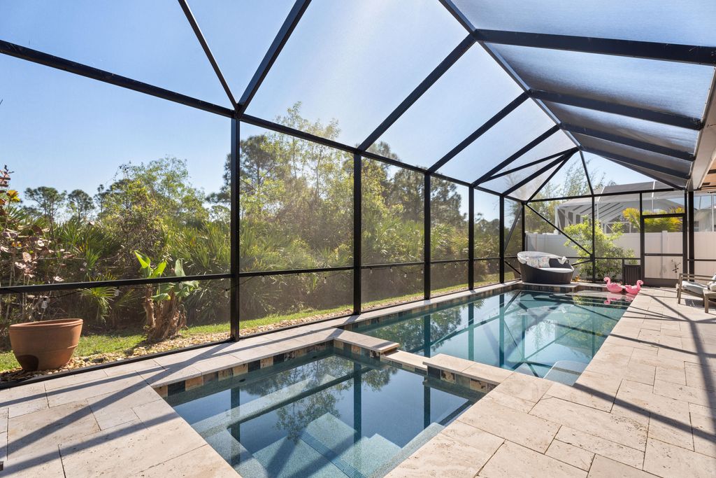 Photo of 445 NW Sunflower Place, Jensen Beach, FL 34957 (MLS # B26008073)