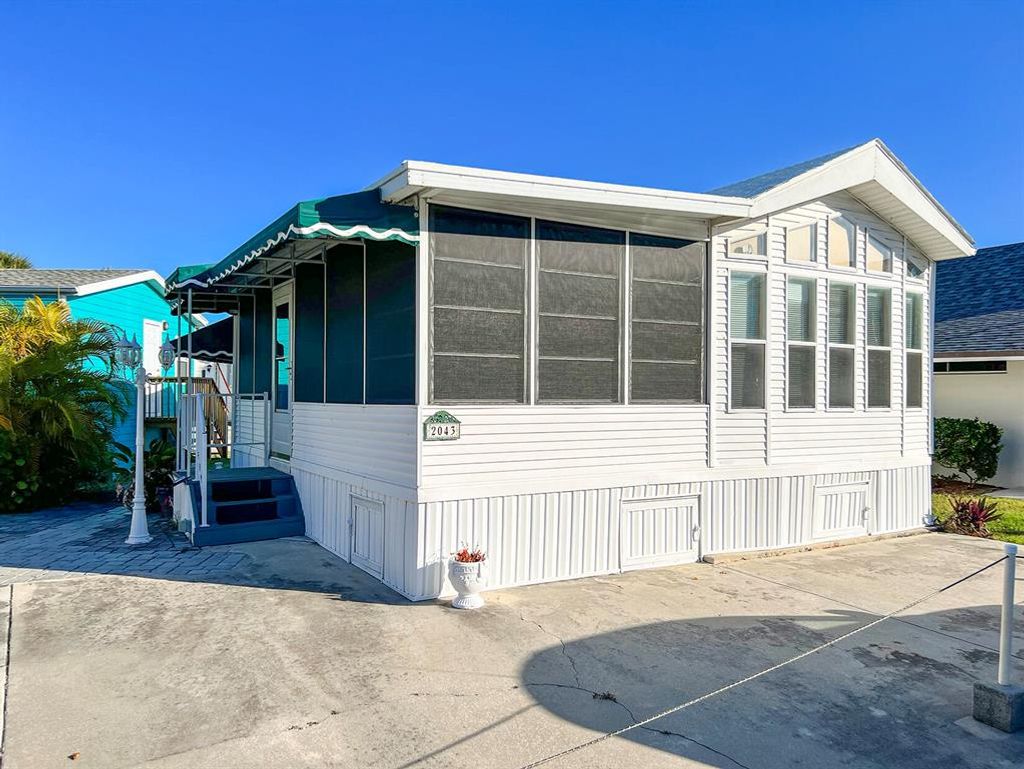 Photo of 2043 Nettles Boulevard, Jensen Beach, FL 34957 (MLS # R10775970)