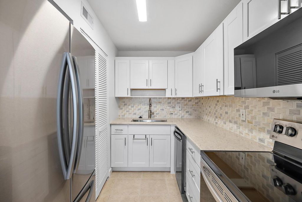 Photo of 12416 Alternate A1a #P7, Palm Beach Gardens, FL 33410 (MLS # B26049864)