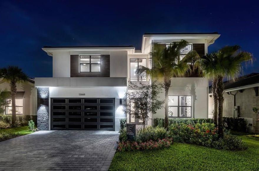 BUILDER MODEL HOME – FULLY FURNISHED! Discover the Manhattan Model at Solana Bay, a 5 Bed / 6 Bath lake-view home featuring two primary suites, a gym, den, loft, and media room. Filled with natural light, this open-concept design offers high ceilings, 32x32 porcelain tile, and an extra-large chef-inspired kitchen with quartz countertops, oversized island, stainless steel appliances, wall oven, built-in microwave, 42" cabinets, and a natural gas cooktop. Includes a 2-car garage, tankless water heater, gas dryer, impact windows/doors, smart home automation, and alarm monitoring. Enjoy a private pool with hot tub and outdoor summer kitchen. Community amenities include a resort-style heated pool, lap pool, tennis, pickleball, fitness center, and cabanas. Square footage approx.