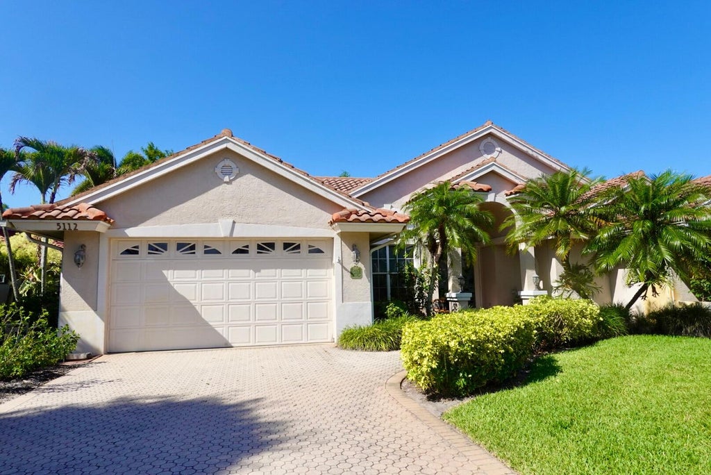 Photo of 5112 SE Lost Lake Way, Hobe Sound, FL 33455 (MLS # B26042842)