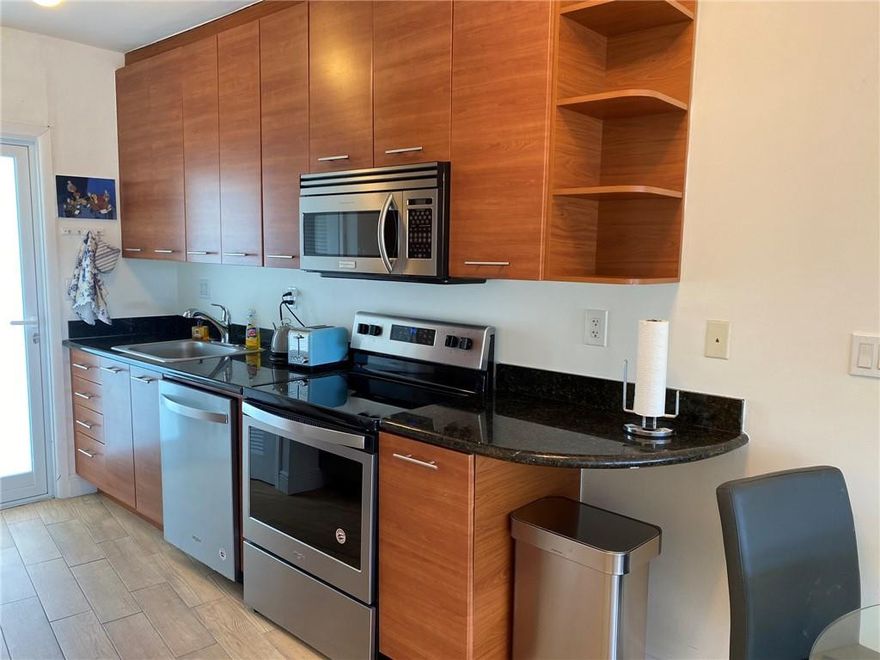 WALK TO THE BEACH FROM THIS BEAUTIFUL UPGRADED 2 BEDROOM 1 BATH CONDO ! NEW STAINLESS STEEL APPLIANCES, GRANITE COUNTERTOPS, TILE FLOORS THROUGHOUT. IMPACT WINDOWS AND DOORS. VERY NICE MODANI FURNITURE INCLUDED! LE CERCLE BY THE BEACH IS A BOUTIQUE BUILDING WITH REMODELED LOBBY, GYM, BIKE STORAGE, COMMUNITY ROOM, BBQ AND A NICE HEATED POOL SURROUNDED BY TROPICAL LANDSCAPE. IT ALSO HAS A 8TH  FLOOR SUN DECK AND BIG LAUNDRY ROOM OVERLOOKING THE POOL. GREAT LOCATION VERY CLOSE TO RESTAURANTS AND SHOPPING. PET FRIENDLY CONDO, YOU CAN RENT IT AFTER ONE YEAR