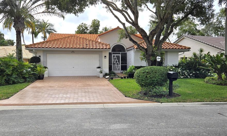 Fabulous, recently redone, largest floorplan in this active 55+ community. 3BR/2BA with an open layout & inviting lake view.  Cul-de-sac location. Enclosed air-conditioned Florida room with glass sliders overlooking the patio. Hi-end gourmet kitchen with stainless steel appliances & range hood. Tons of cabinets, deep drawers, & extra wide counters & storage. Upgraded bathroom finishes. Redesigned closets & built-ins for maximum use.  Spacious primary suite with luxury vinyl floor includes renovated bath with double vanity & custom cabinets.  Guest bedroom 1/office with custom Murphy bed system & cabinets.  Impressive double door entry leads to a 2-car garage with A/C. New lighting & pipes. New roof 2016, A/C 2020, 50-gallon hot water heater 2017, house painted & roof power washed in 2025.