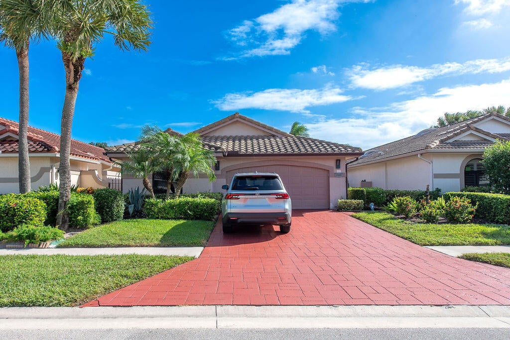 Photo of 15408 Strathearn Drive, Delray Beach, FL 33446 (MLS # B26093553)