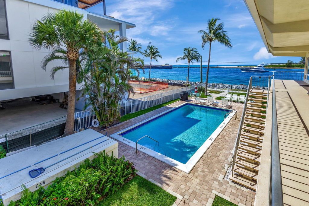 Photo of 214 Inlet Way #204, Palm Beach Shores, FL 33404 (MLS # R10993402)