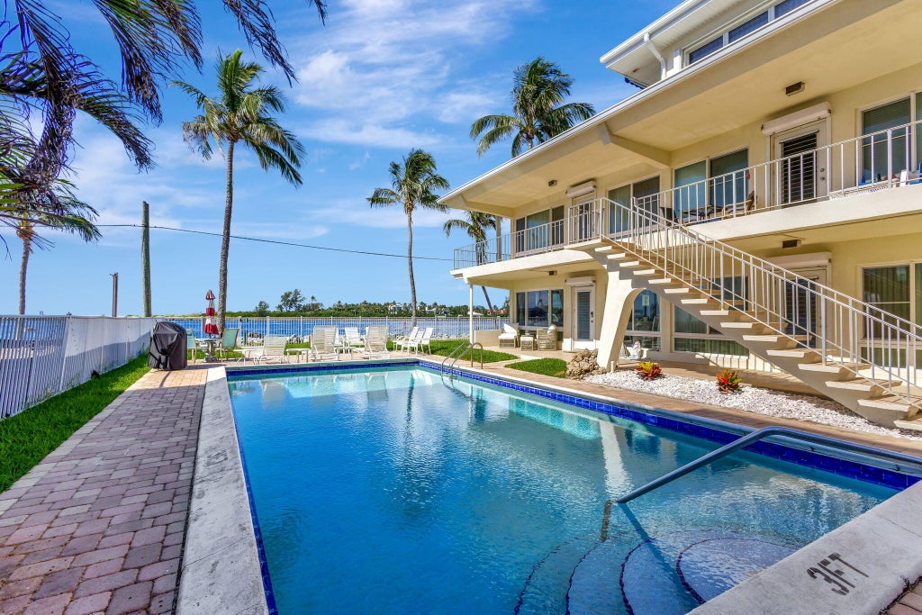 Photo of 214 Inlet Way #204, Palm Beach Shores, FL 33404 (MLS # R10993402)