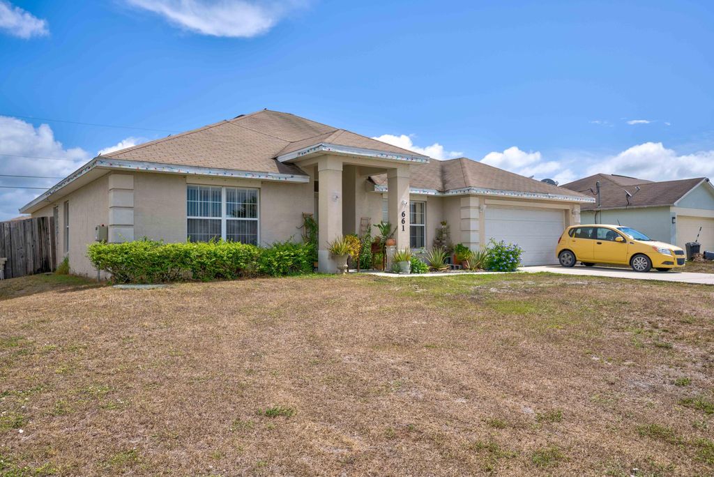 Photo of 661 SW Sardinia Avenue, Port Saint Lucie, FL 34953 (MLS # R10798808)