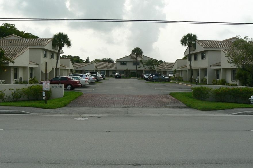 TOWNHOUSE FULLY TILED IN QUIET 21 UNIT COMPLEX.  POOL, W/D, PARK AT YOUR DOOR.  FULL ACCORDION HURRICANE SHUTTERS. CONVENIENT LOCATION CLOSE TO SCHOOLS, PARKS, SHOPPING, SAWGRASS EXPRESSWAY