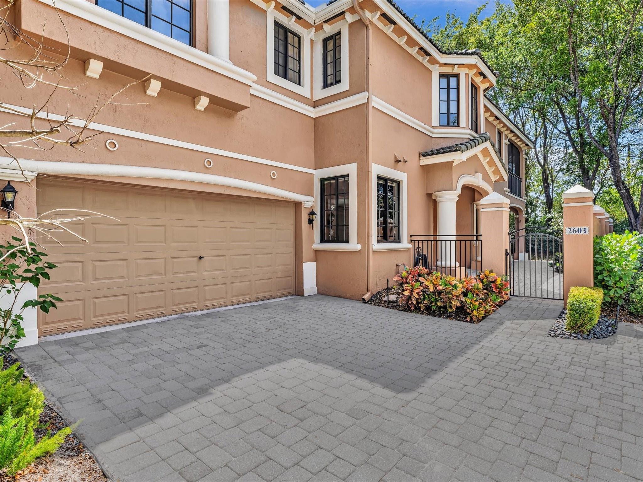 Welcome to this stunning 3BR 2Bath luxury villa located in the prestigious Courtside at Weston Hills Country Club. Professionally designed and decorated. The 3rd BR is currently utilized as a media/office/Den. Features: custom built-in closets, contemporary lighting fixtures, and sleek stainless-steel appliances. The gourmet kitchen is complete with upgraded cabinetry, convenient pull-out shelves & drawers for easy access & organization. The expansive open and covered patio, with soaring high ceilings, offers the perfect space to relax and entertain. Step outside to your own private outdoor oasis, designed for maximum enjoyment & relaxation. An ideal location with exceptional finishes thru-out. Rarely available villa is 1 of 6 one-floor models within Courtside. Truly one-of-a kind gem!