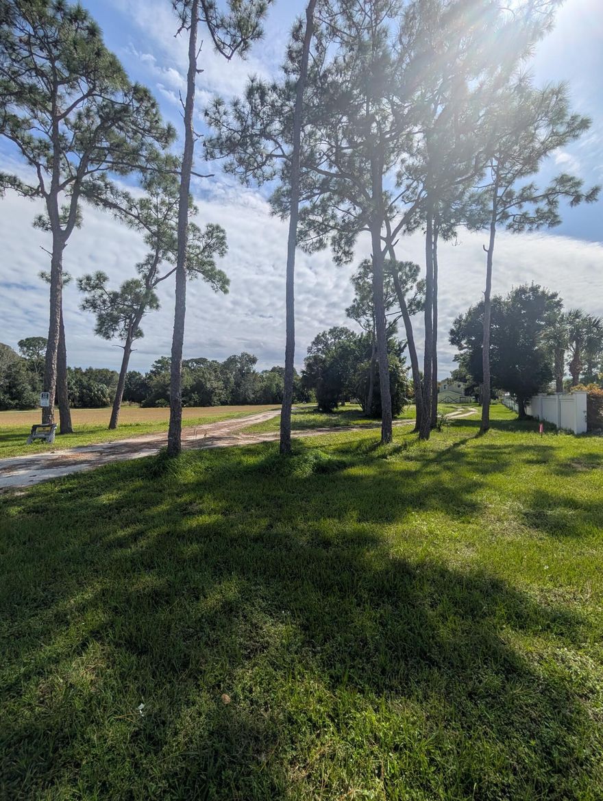 This convenient location has been rezoned multi family! Owner has survey in hand. Other purposes possible check with Martin County for your particular situation. There are 3 houses on property presently considered teardown so ready to build Electric and water already on site! Access road off Cove Rd on Grace Lane for easy access to property. Owner had the property accepted survey through Martin County sectioning off property into 4 half acre apx parcels allowing 2 houses One half the size of primary home per lot on a accepted survey(see attach) We have included another possibility that has NOT been approved but to show other possible options Buye/ broker to use due diligence for intended use for property! Owner/Broker not responsible for errors on report! Please Verify with Martin county!