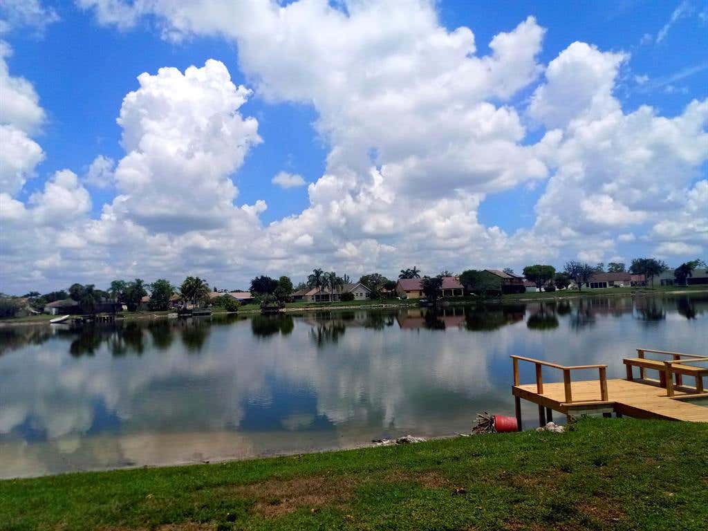 Photo of 8541 Bonita Isle Drive Dr, Lake Worth Beach, FL 33467 (MLS # R10765312)