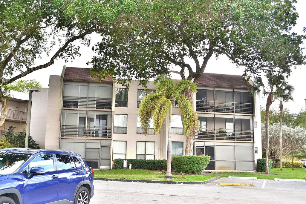 Photo of 8150 W Mcnab Road #210, Tamarac, FL 33321 (MLS # F10556137)