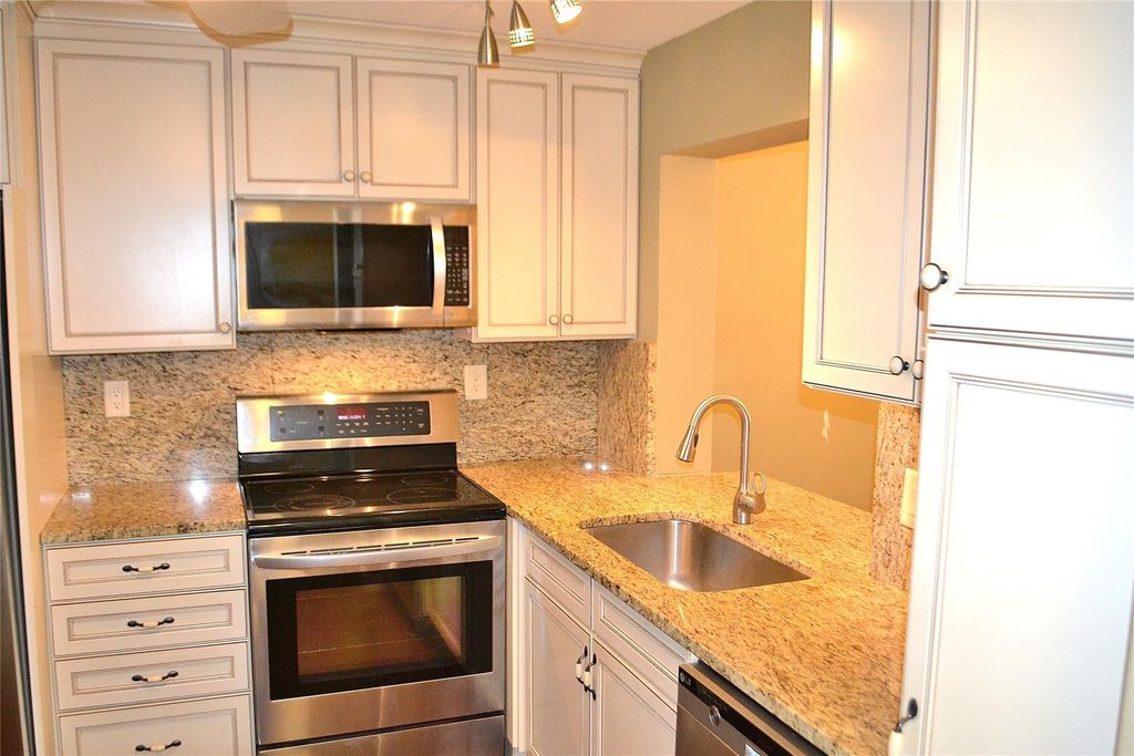 Photo of 8150 W Mcnab Road #210, Tamarac, FL 33321 (MLS # F10556137)