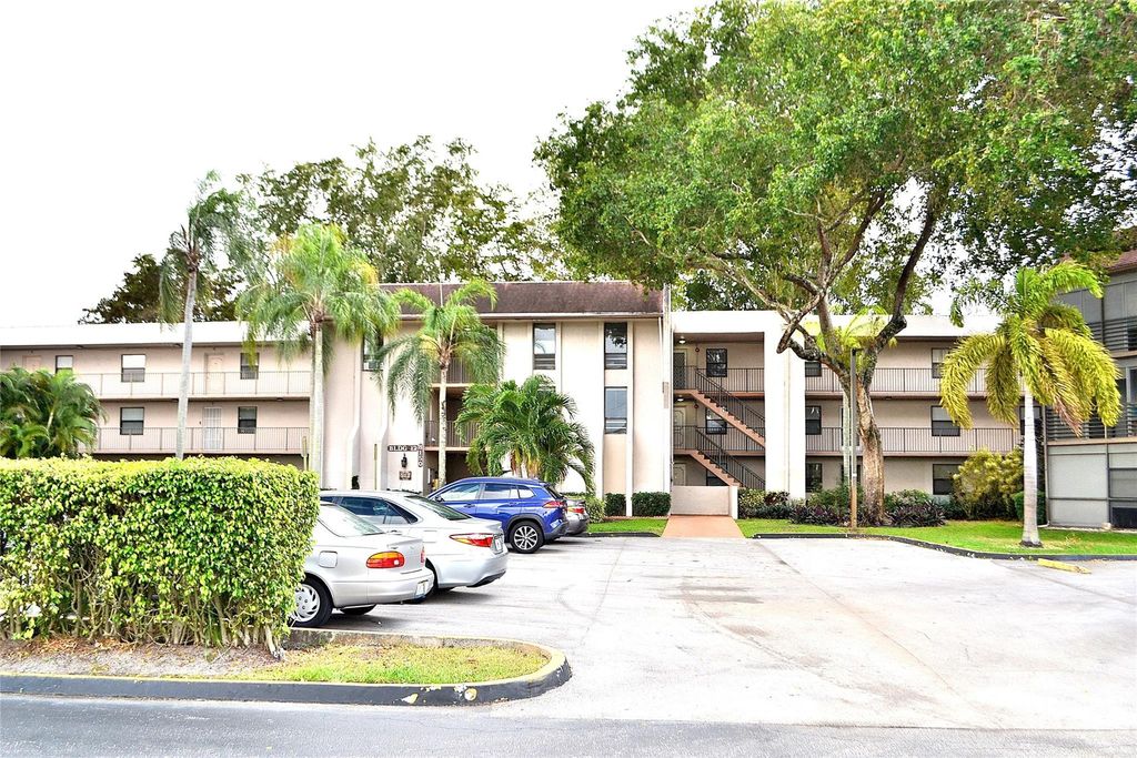 Photo of 8150 W Mcnab Road #210, Tamarac, FL 33321 (MLS # F10556137)