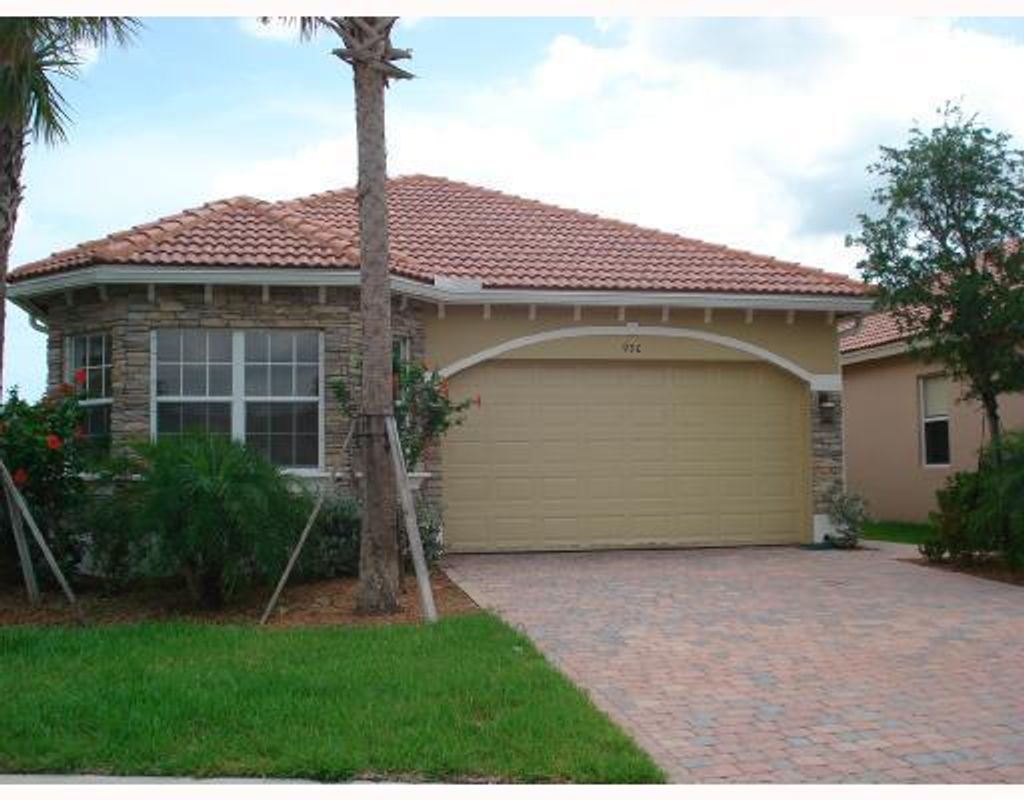 Photo of 930 NW Leonardo Circle, Port Saint Lucie, FL 34986 (MLS # R10966936)