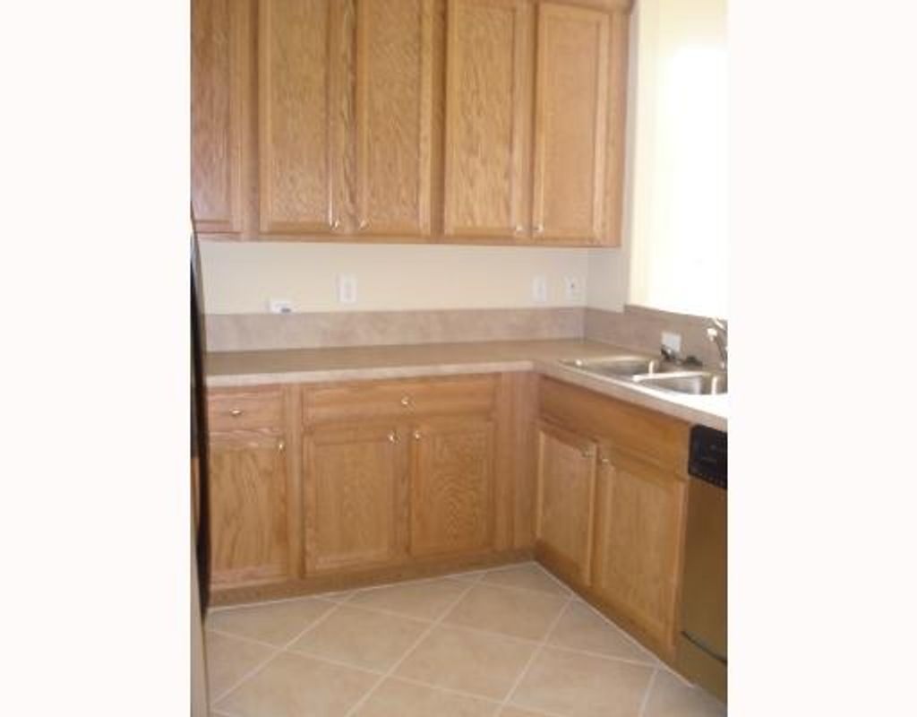 Photo of 930 NW Leonardo Circle, Port Saint Lucie, FL 34986 (MLS # R10966936)