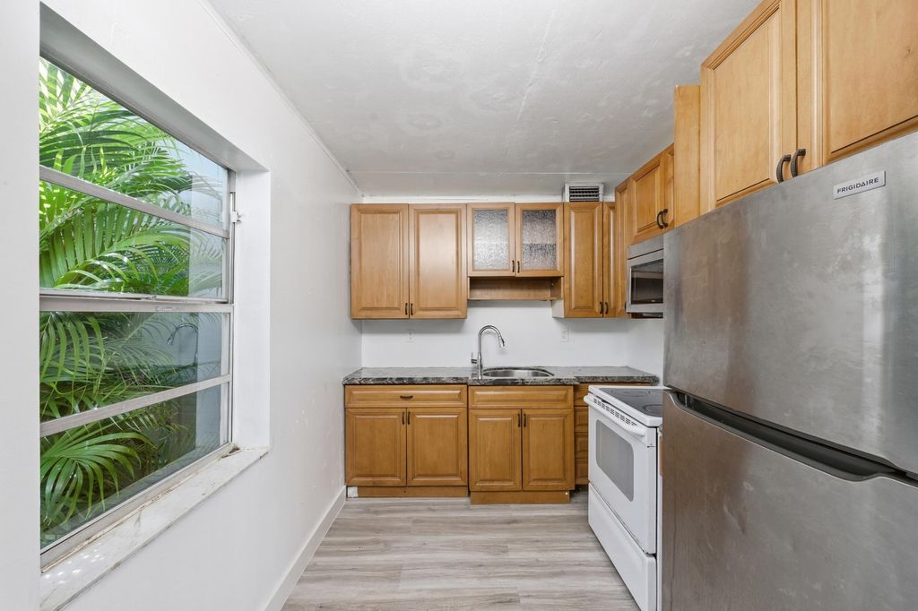 Photo of 452 Normandy Ln #J, Delray Beach, FL 33484 (MLS # B26021929)