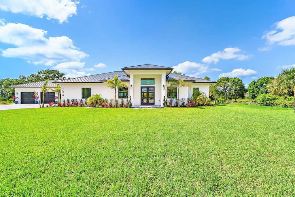 Photo of 7574 169th Place N, Palm Beach Gardens, FL 33418 (MLS # R11107334)