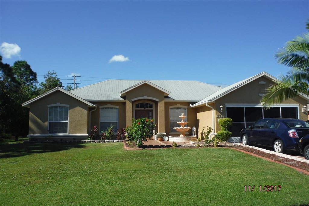 Photo of 5542 NW Kappa Court Ct NW, Port Saint Lucie, FL 34986 (MLS # R10810503)