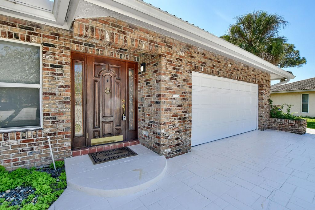 Photo of 2334 Timbercreek Circle NW, Boca Raton, FL 33431 (MLS # B26009097)