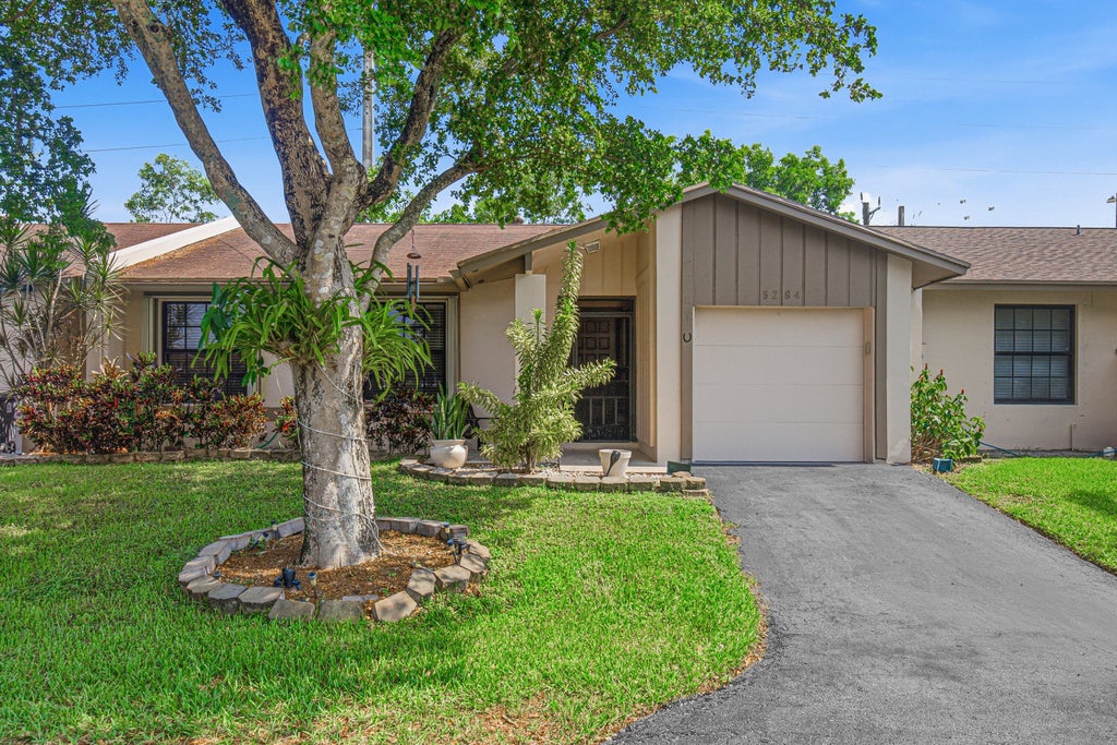 Photo of 5284 Breadfruit Circle, Delray Beach, FL 33484 (MLS # B26054550)