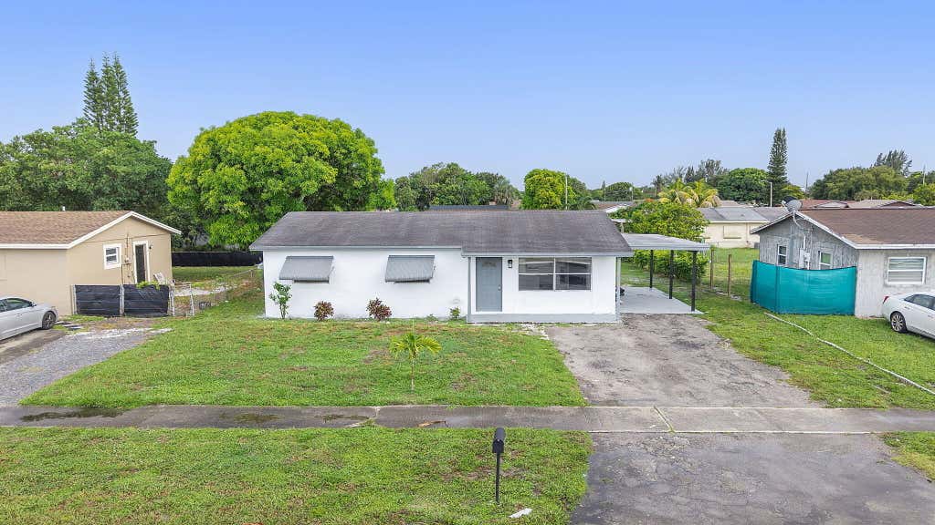 Photo of 316 NW 6th Court, Deerfield Beach, FL 33441 (MLS # B26057469)