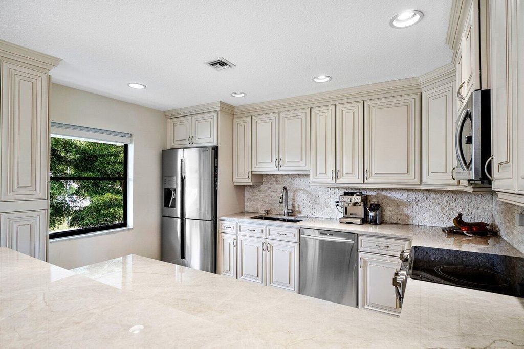 Photo of 3652 Quail Ridge Drive N #Green Heron S, Boynton Beach, FL 33436 (MLS # R10774202)