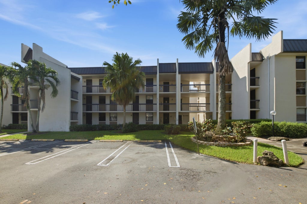 Photo of 8409 Forest Hills Drive #206, Coral Springs, FL 33065 (MLS # B26062839)