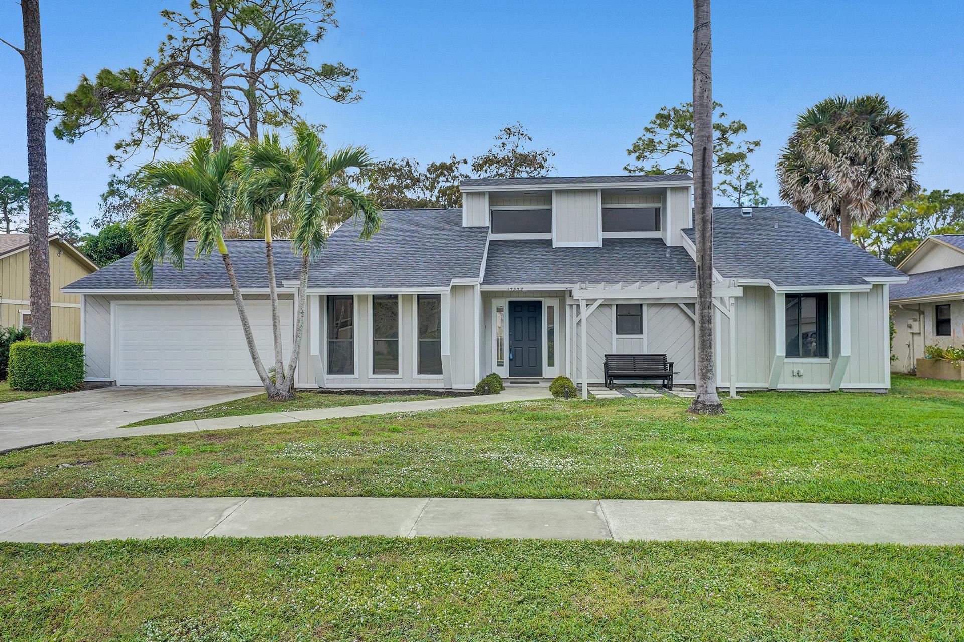 Step into luxury with this immaculate 3-bedroom, 2-bath residence, where modern elegance meets tropical tranquility. Every inch of this home has been masterfully upgraded--featuring a newer chef's kitchen with premium stainless steel appliances, crisp white quartz countertops, and a designer subway tile backsplash. The open, split-bedroom floor plan offers both privacy and flow, enhanced by wide-plank LVP flooring and sleek finishes throughout.Enjoy seamless indoor-outdoor living as you step into your own private paradise--complete with a resort-style pool, lush tropical landscaping, and an expansive patio perfect for entertaining or relaxing under the Florida sun.Whether you're looking for your full-time residence, a seasonal escape, or a high-end investment opportunity,