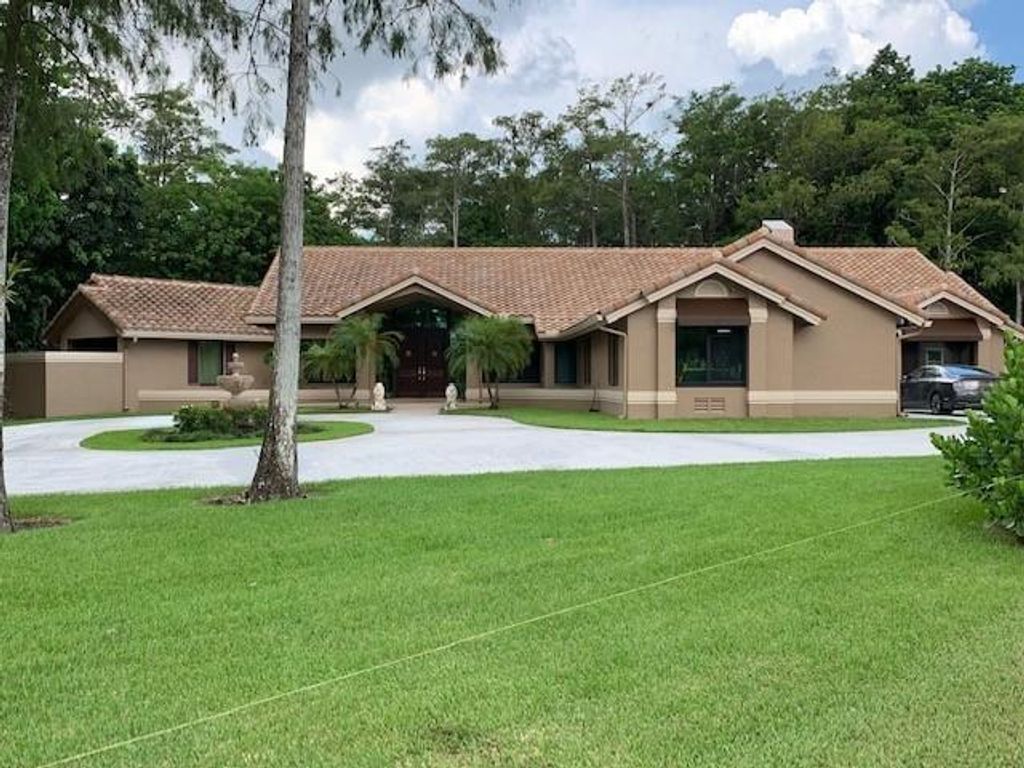 Photo of 6445 NW 72nd Way, Parkland, FL 33067 (MLS # F10321372)