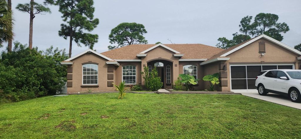 Photo of 1169 SW Kapok Avenue, Port St Lucie, FL 34953 (MLS # R10928072)