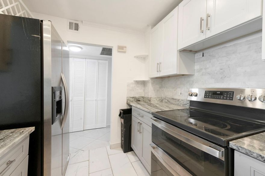 Beautifully updated 2-bedroom, 2-bathroom condo featuring an open kitchen and renovated bathrooms, creating a stylish and comfortable living space. The expansive screened-in balcony, accessible from both bedrooms and the living room. Impact windows and sliding glass doors throughout. Maintenance includes water, sewer, garbage, pest control, cable, and internet. Enjoy outstanding community amenities including two pools, clubhouse, gym, and barbecue/picnic area. Ideally located within walking distance to a park, golf course, and houses of worship. The complex is currently undergoing its 50-year recertification and modernization, including new balconies and screening, plus a new clubhouse with a state-of-the-art gym.