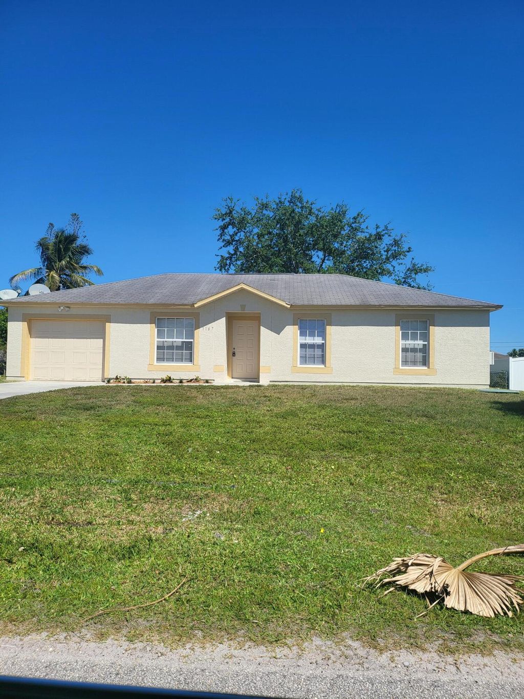 Photo of 1167 SW Curtis Street, Port Saint Lucie, FL 34983 (MLS # R11094984)