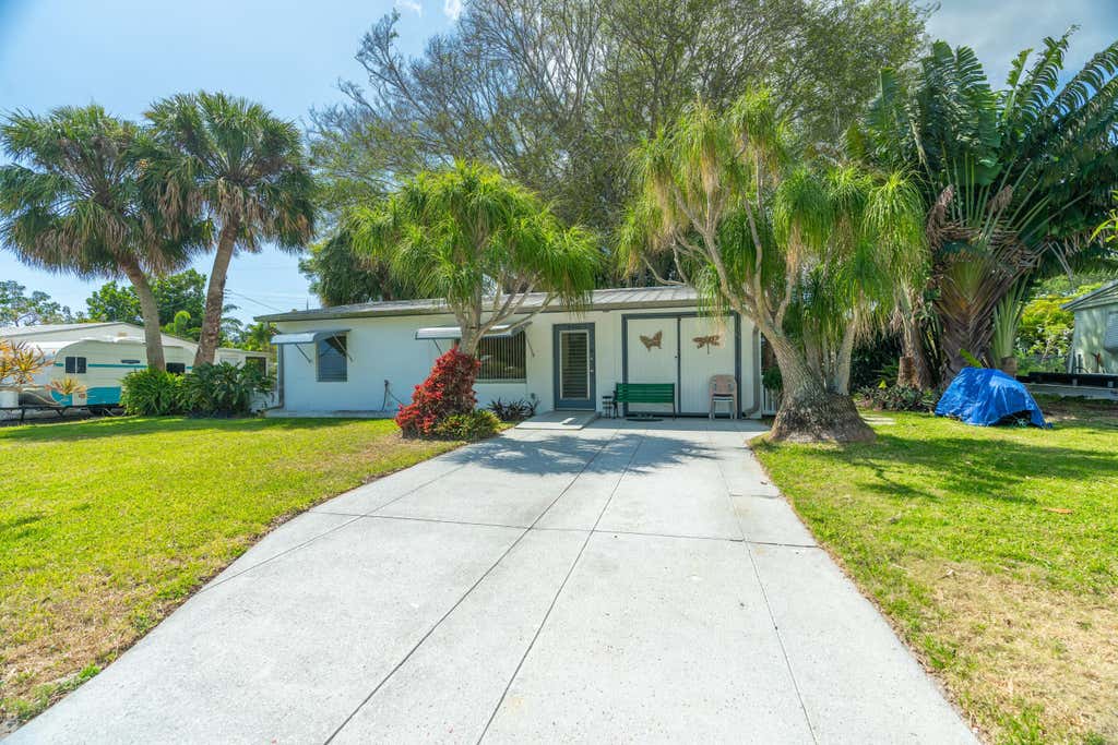 Photo of 2556 NE Letitia Street, Jensen Beach, FL 34957 (MLS # R10977412)