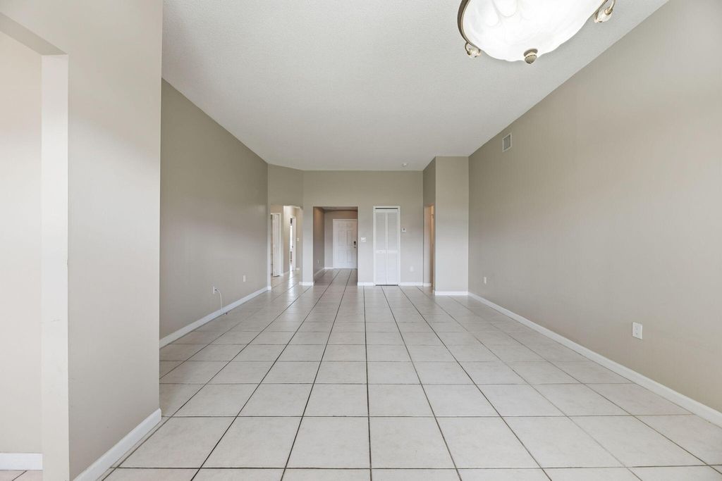Photo of 345 W Cypress Cove Circle, Davie, FL 33325 (MLS # B26029336)