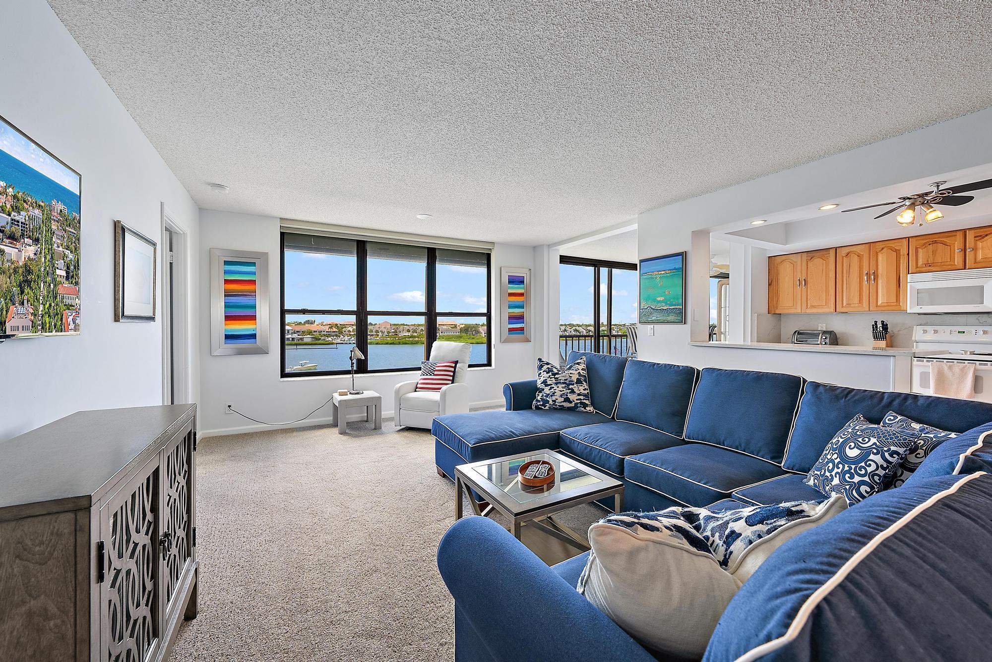 Welcome to paradise! This beautiful 2-bedroom, 2-bathroom condo in the sought-after Jupiter Cove community offers breathtaking views of the Intracoastal Waterway and dock from every room.Both bathrooms have been tastefully renovated, offering modern finishes and a fresh, spa-like feel. The condo also features hurricane impact windows throughout, providing peace of mind, energy efficiency, and added quiet. The open living space flows seamlessly into a screened balcony, ideal for relaxing or entertaining with a view.Jupiter Cove is a vibrant, gated community with resort-style amenities including a heated pool, fitness room, pickleball and tennis courts, and the beloved Pelican Park--complete with a tiki bar, picnic tables, grills, and a kayak/paddle board stand for your outdoor