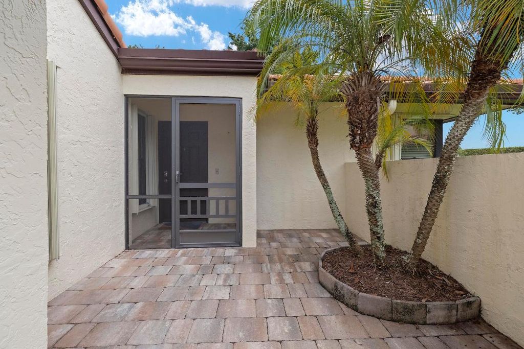 Photo of 5317 Fig Palm Way #B, Boynton Beach, FL 33437 (MLS # R11125575)